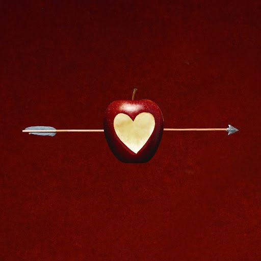 Apple pierced by an arrow with a heart-shaped center