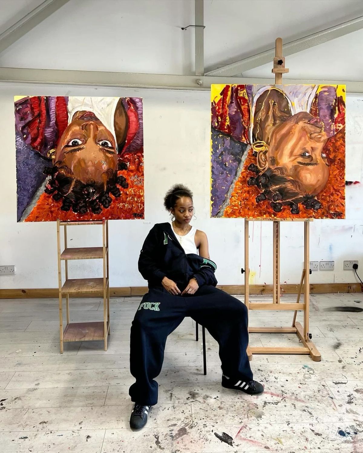 Sade Watkins seated in an art studio