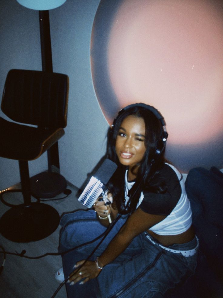 Alicia Leon holding a microphone