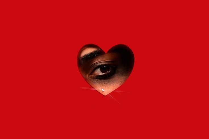 Eye inside a heart on a red background