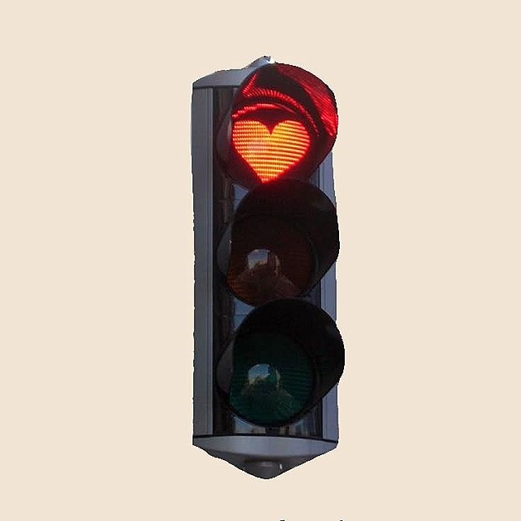 Traffic light with a glowing heart signal
