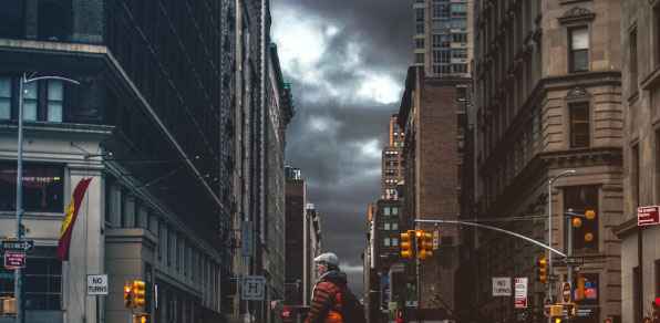 New York Street with dark clouds overhead