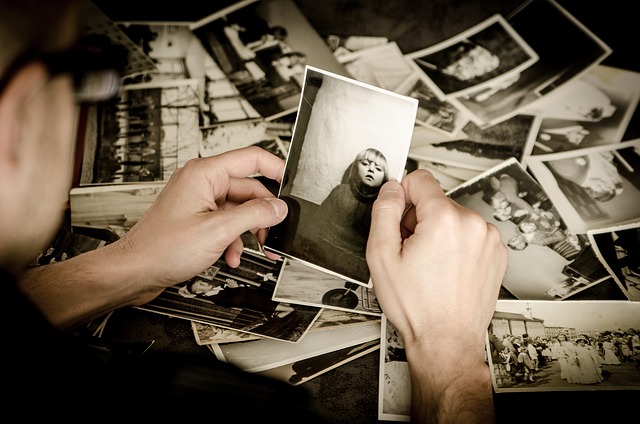 Holding a black and white photo