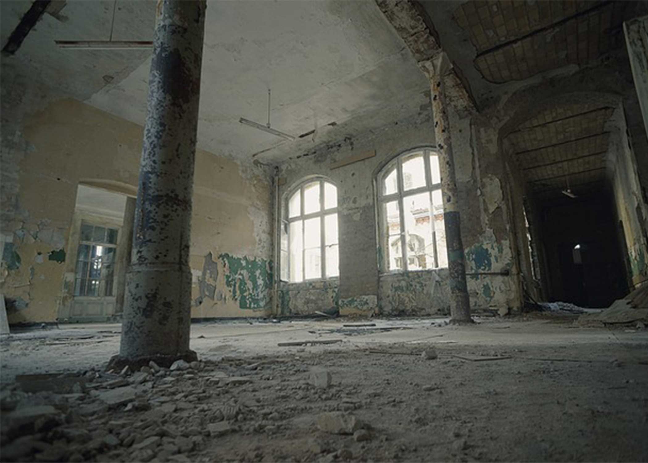 Abandoned building covered in rubble